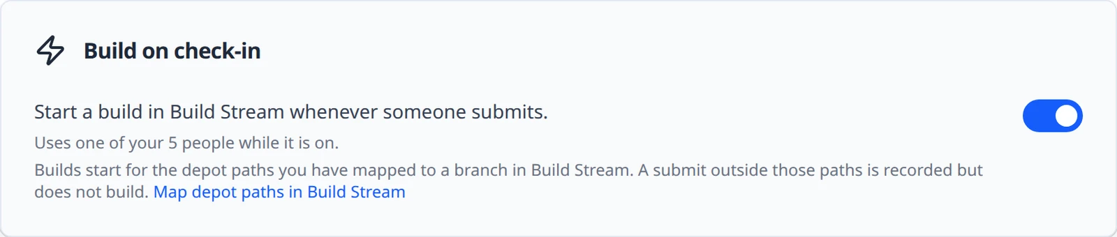 The Build on check-in card on a Free plan server with the switch on, the note Uses one of your 5 people while it is on, and the mapped-paths sentence with the Map depot paths in Build Stream link.